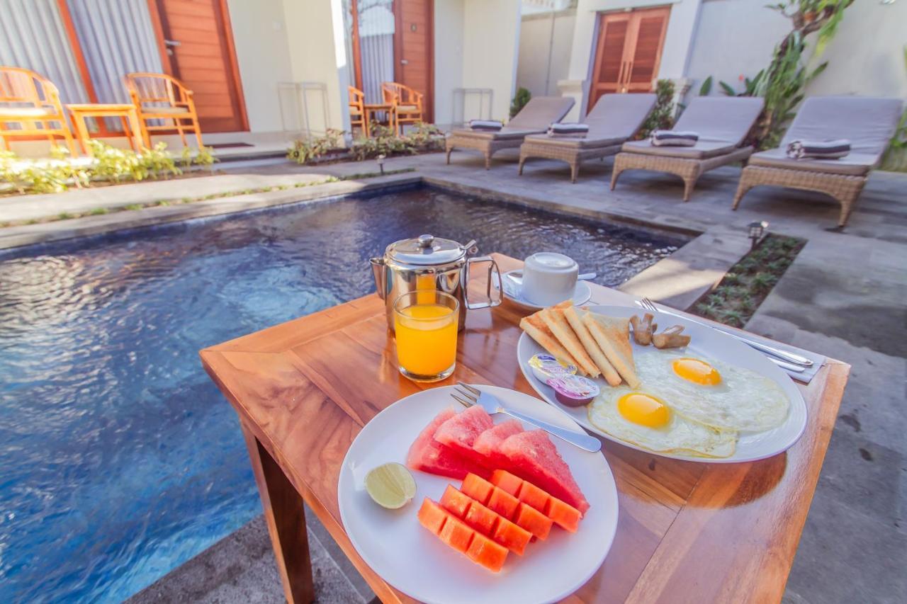 Отель Cening Ayu Sanur Экстерьер фото